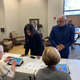 Portia Ballard Espy, left, and Mike Espy, right, checking in to vote at Highland Colony Baptist Church on Tuesday, November 27, 2018.